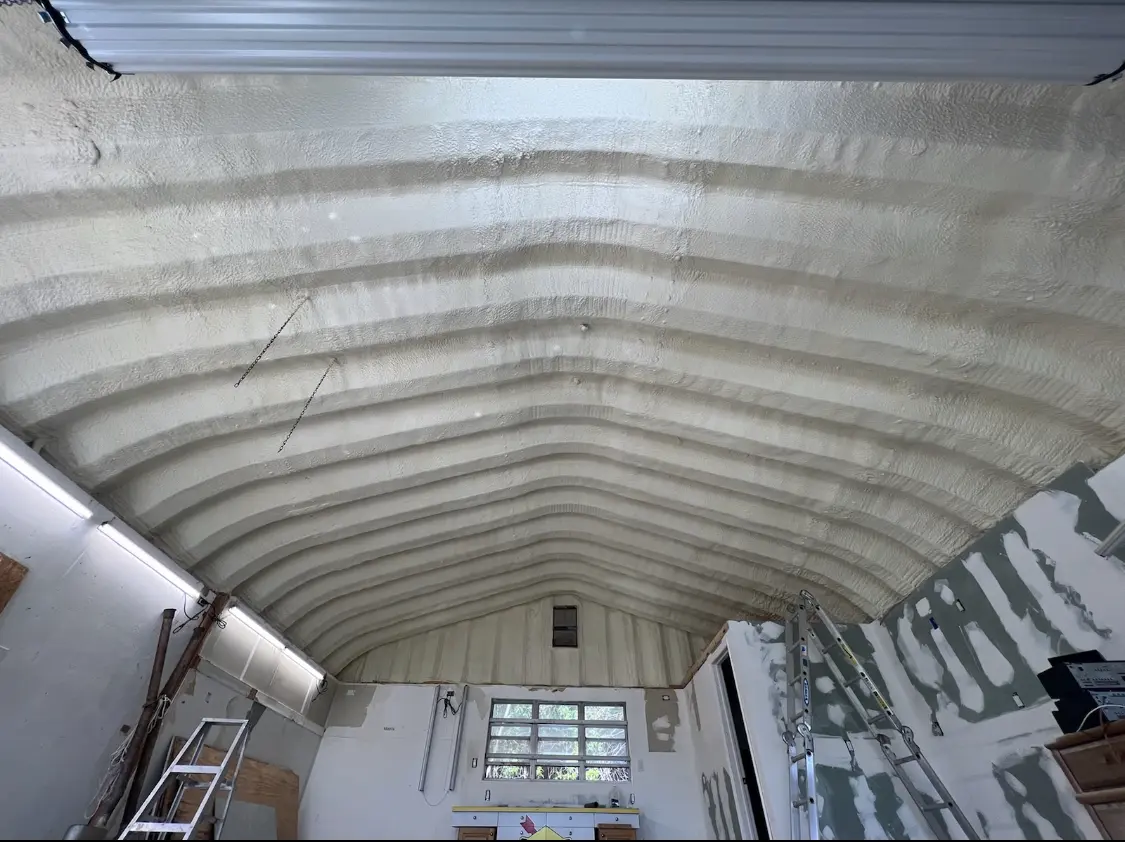 Spray polyurethane foam applied to the underside of a metal roof deck in Cleveland Heights